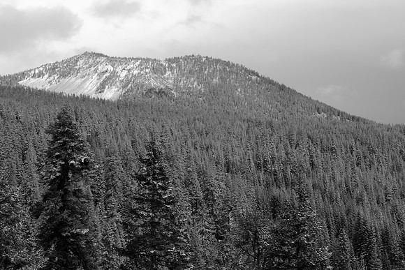Volcanic Peak Under Clouds