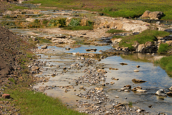 Outflow of a Hot Spring Field